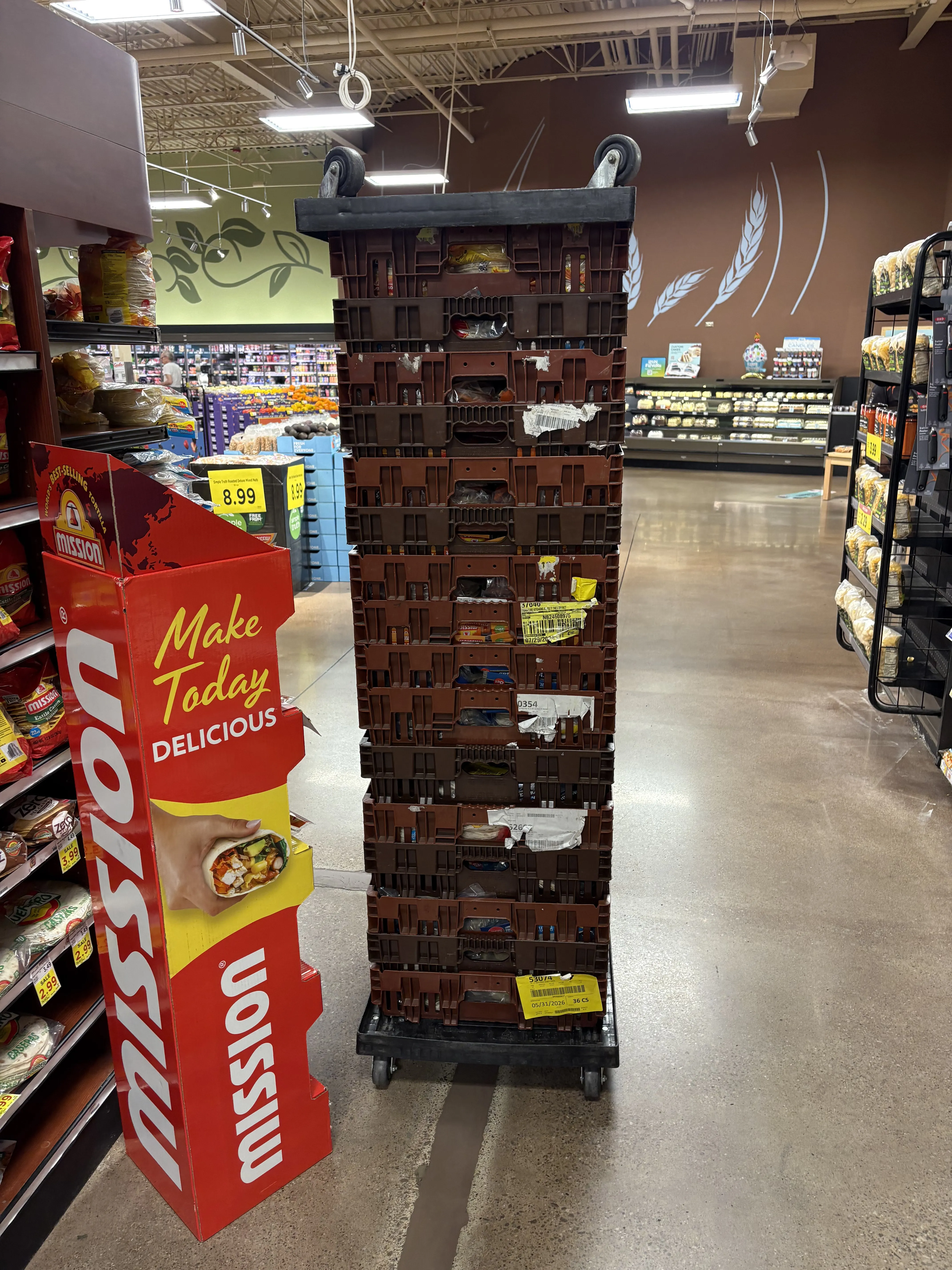 A Mission product display and stocked delivery tower on the grocery floor